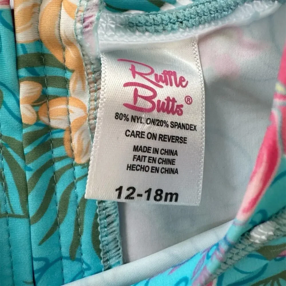 Ruffle Butts Orchid Oasis One Piece Rash Guard Swimwear Size 12-18 M UPF +50